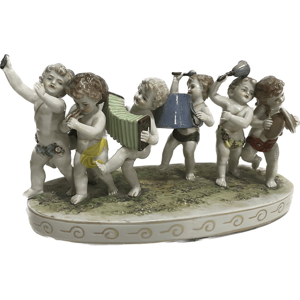 Figura de porcelana, escena de niños musicos